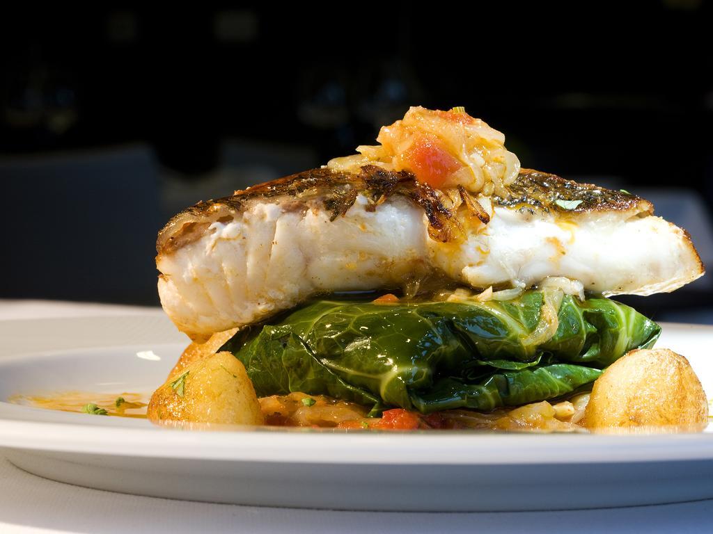 Melia Braga Hotel & Spa Dış mekan fotoğraf A prepared dish of halibut